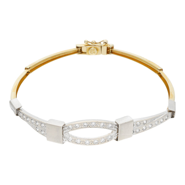 Pulsera eslabón articulado con circonias en oro dos tonos 14 kilates.