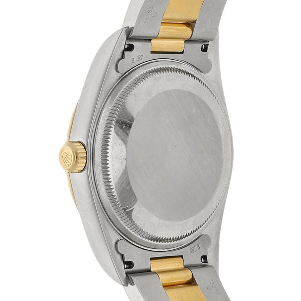 Reloj Rolex para caballero modelo Oyster perpetual Date con vistas en oro amarillo 18 kilates.
