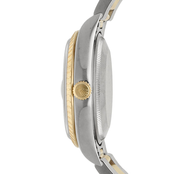 Reloj Rolex para caballero modelo Oyster perpetual Date con vistas en oro amarillo 18 kilates.