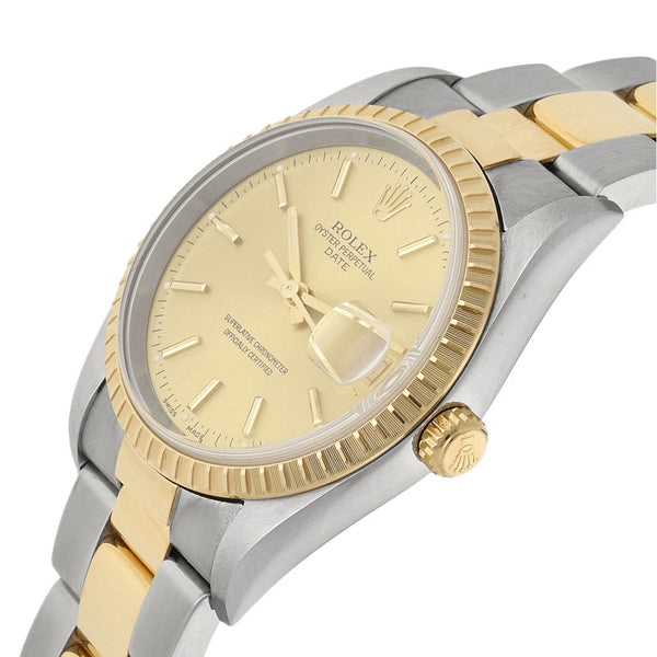 Reloj Rolex para caballero modelo Oyster perpetual Date con vistas en oro amarillo 18 kilates.