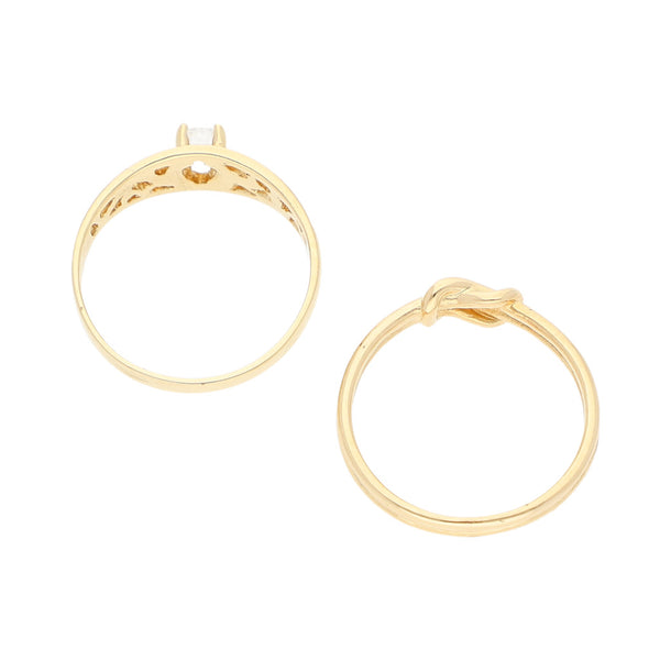 Dos anillos diseño especial con circonia en oro amarillo 14 kilates.