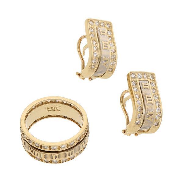 Juego de anillo y aretes diseño especial con circonias en oro dos tonos 14 kilates.