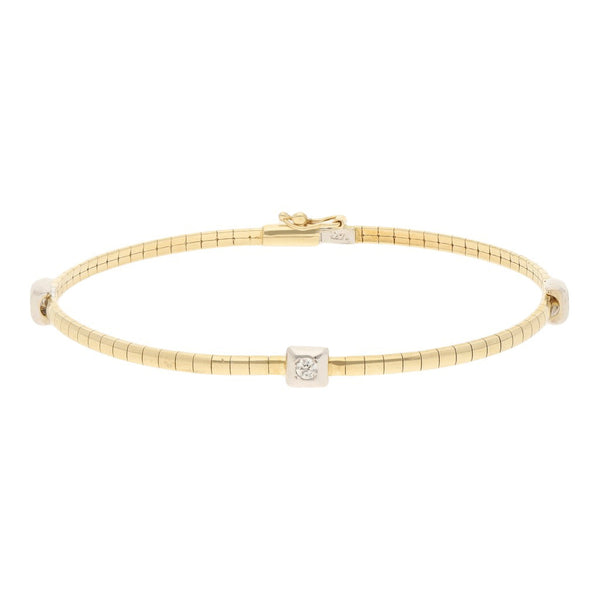 Pulsera eslabón articulado con aplicaciones de sintéticos en oro dos tonos 14 kilates.