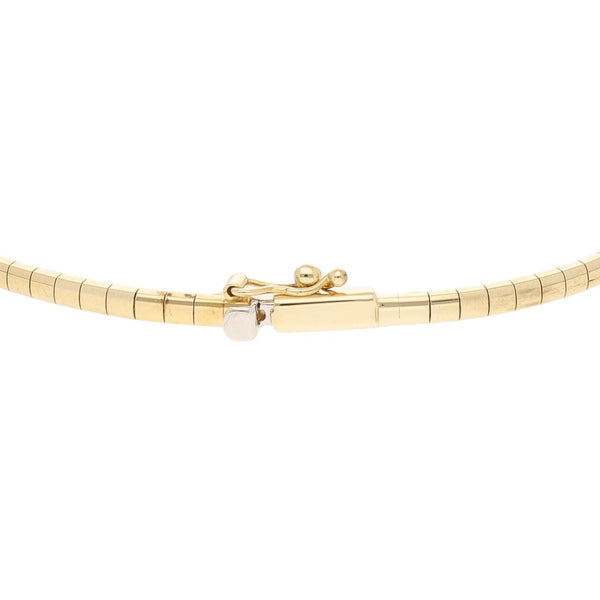 Pulsera eslabón articulado con aplicaciones de sintéticos en oro dos tonos 14 kilates.