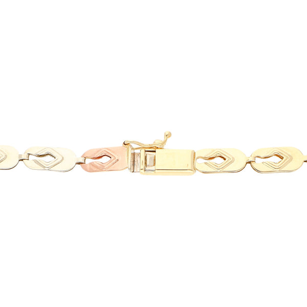Pulsera eslabón laminado en oro tres tonos 14 kilates.