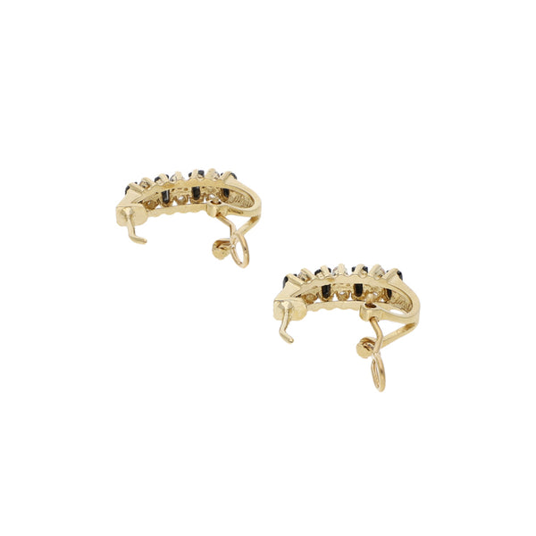 Juego de Anillo y aretes diseño especial con sintéticos en oro amarillo 14 kilates.