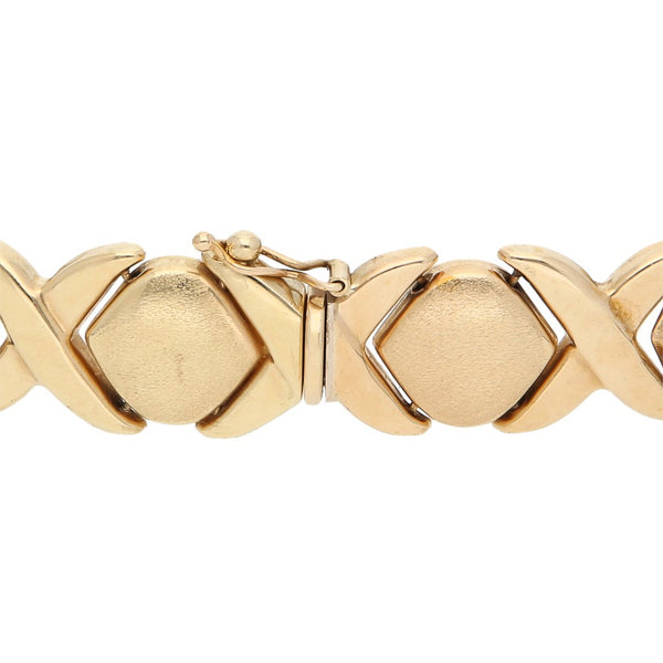 Pulsera eslabón XOXO en oro amarillo 14 kilates.