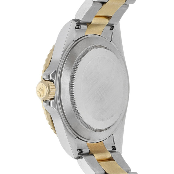 Reloj para caballero modelo Oyster Perpetual Date Submariner vistas en oro amarillo 18 kilates.