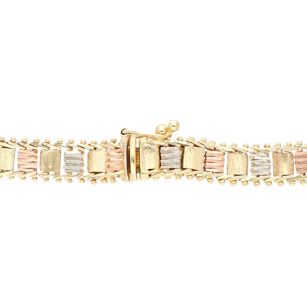 Pulsera eslabón boleado en oro tres tonos 14 kilates.