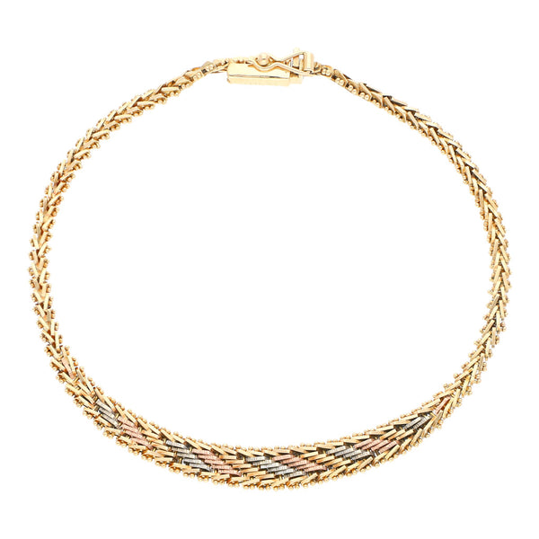 Pulsera eslabón boleado en oro tres tonos 14 kilates.