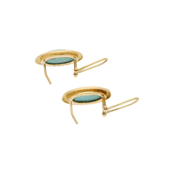 Juego de Anillo y Aretes diseño especial con turquesas en oro amarillo 14 kilates.