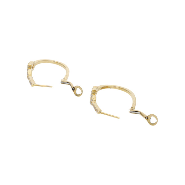 Arracadas diseño especial con circonias en oro amarillo 14 kilates.