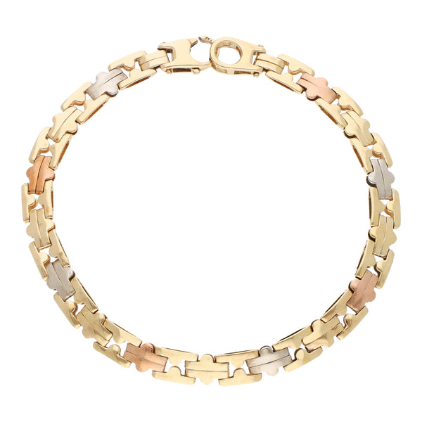 Pulsera eslabón articulado en oro tres tonos 14 kilates.