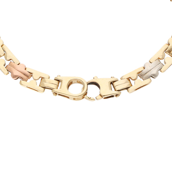 Pulsera eslabón articulado en oro tres tonos 14 kilates.