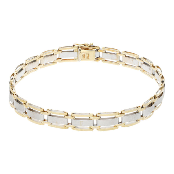 Pulsera eslabón articulado en oro dos tonos 14 kilates.