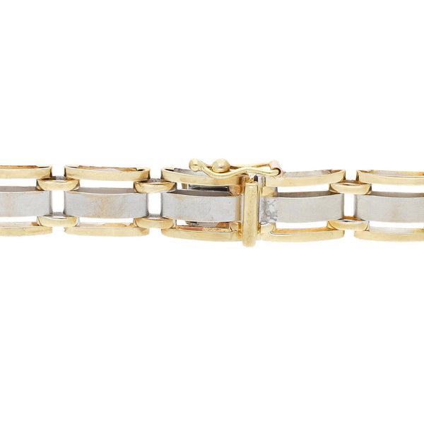 Pulsera eslabón articulado en oro dos tonos 14 kilates.