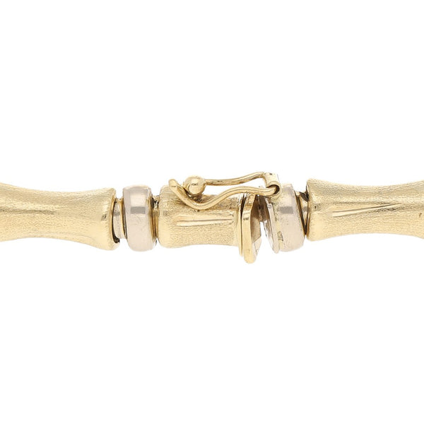 Pulsera eslabón articulado en oro amarillo 14 kilates.