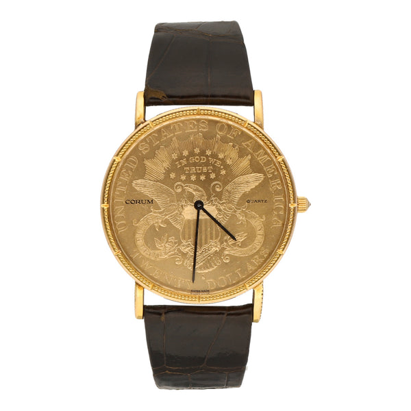 Reloj Corum para caballero modelo Heritage Coin caja y broche en oro amarillo 18 kilates.