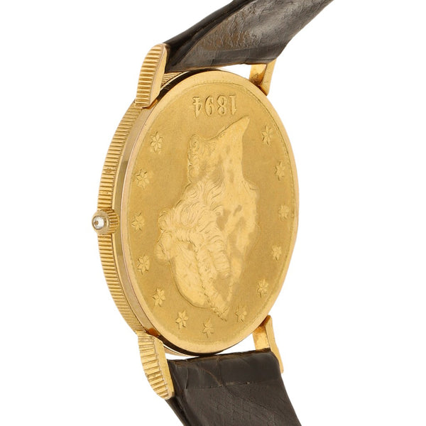 Reloj Corum para caballero modelo Heritage Coin caja y broche en oro amarillo 18 kilates.