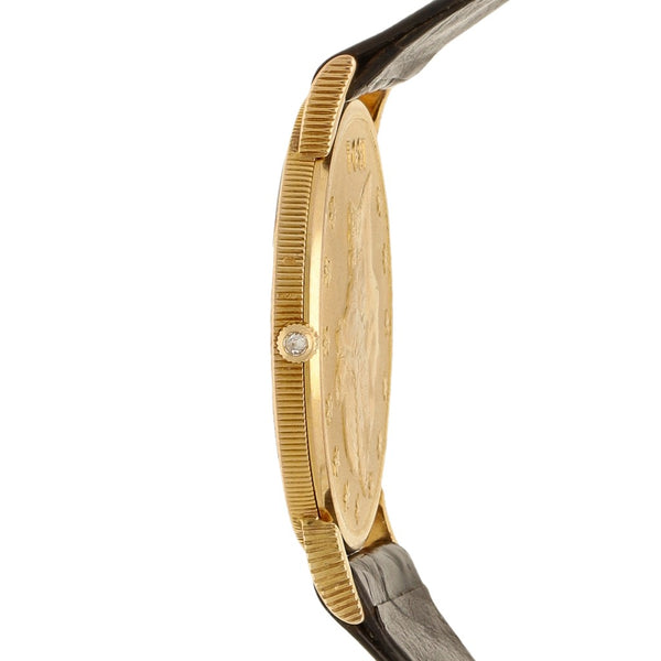 Reloj Corum para caballero modelo Heritage Coin caja y broche en oro amarillo 18 kilates.