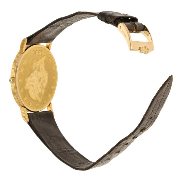 Reloj Corum para caballero modelo Heritage Coin caja y broche en oro amarillo 18 kilates.