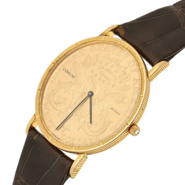 Reloj Corum para caballero modelo Heritage Coin caja y broche en oro amarillo 18 kilates.