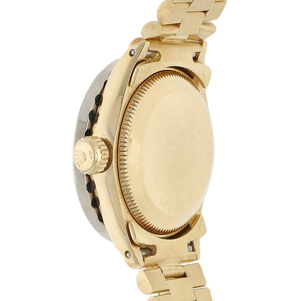 Reloj Rolex para dama modelo Oyster Perpetual Date en oro tres tonos 18 kilates.