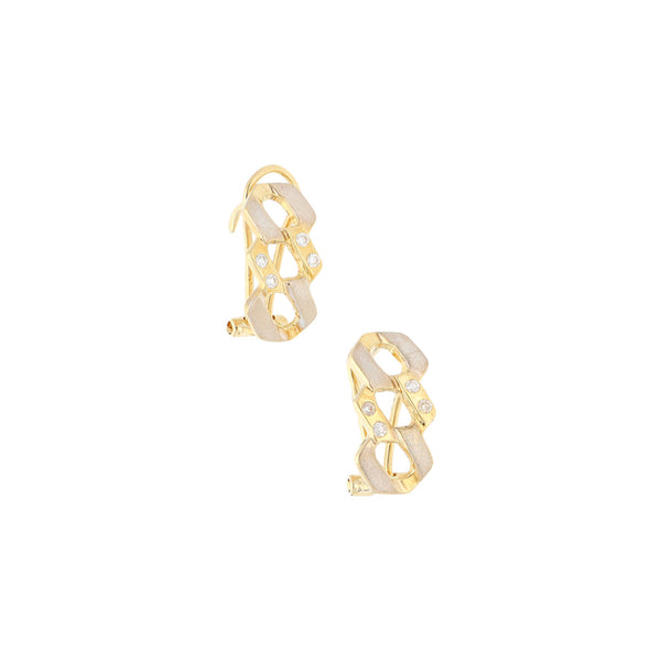 Aretes calado con circonias en oro amarillo 14 kilates.