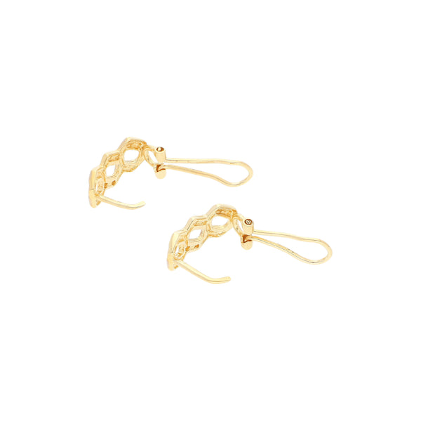Aretes calado con circonias en oro amarillo 14 kilates.