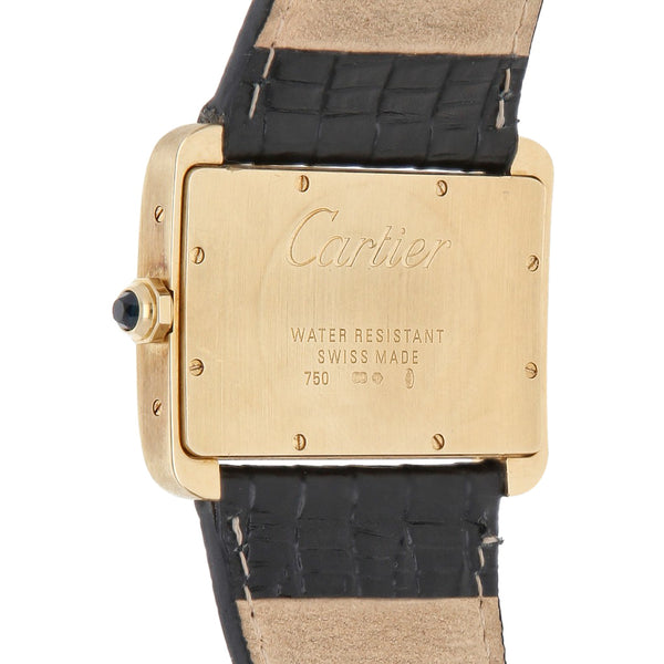 Reloj Cartier para caballero modelo Tank Divan caja y broche en oro amarillo 18 kilates.