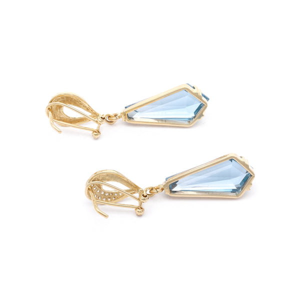 Aretes diseño especial con aguamarinas y circonias en oro amarillo 14 kilates.