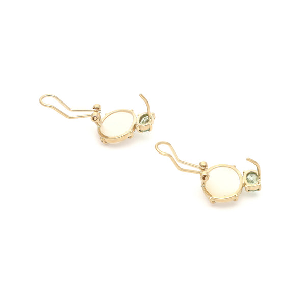 Juego de anillo y aretes diseño especial con perla y turmalina en oro amarillo 14 kilates.