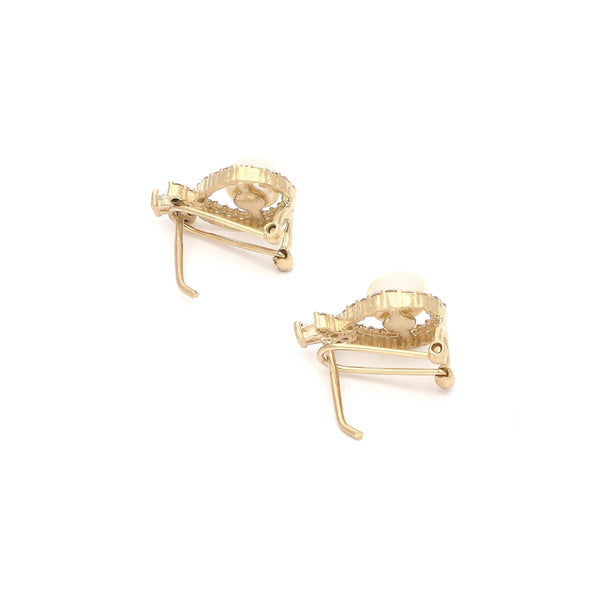 Aretes diseño especial con perlas y circonias en oro amarillo 14 kilates.