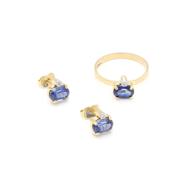 Juego de anillo y aretes diseño especial con zafiros y circonias en oro amarillo 14 kilates.