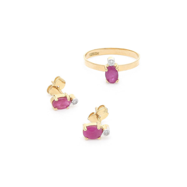 Juego de anillo y aretes diseño especial con rubí y circonias en oro amarillo 14 kilates.