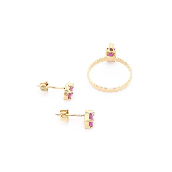 Juego de anillo y aretes diseño especial con rubí y circonias en oro amarillo 14 kilates.
