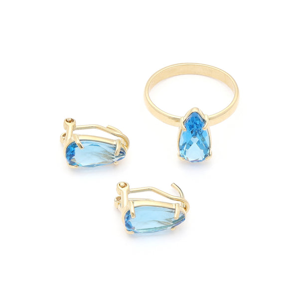 Juego de anillo y aretes diseño especial con topacio en oro amarillo 14 kilates.