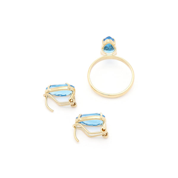 Juego de anillo y aretes diseño especial con topacio en oro amarillo 14 kilates.