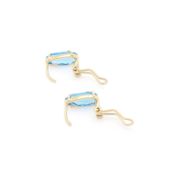 Juego de anillo y aretes diseño especial con topacio en oro amarillo 14 kilates.
