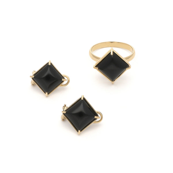 Juego de anillo y aretes diseño especial con ónix en oro amarillo 14 kilates.