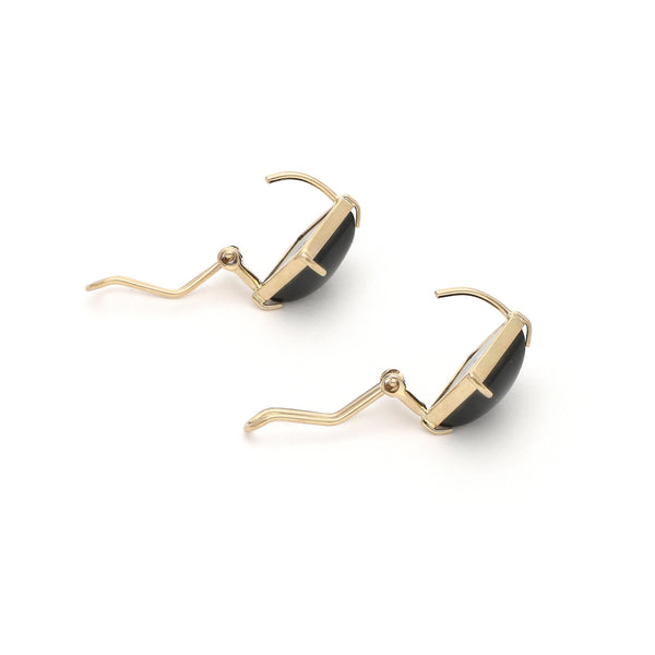 Juego de anillo y aretes diseño especial con ónix en oro amarillo 14 kilates.