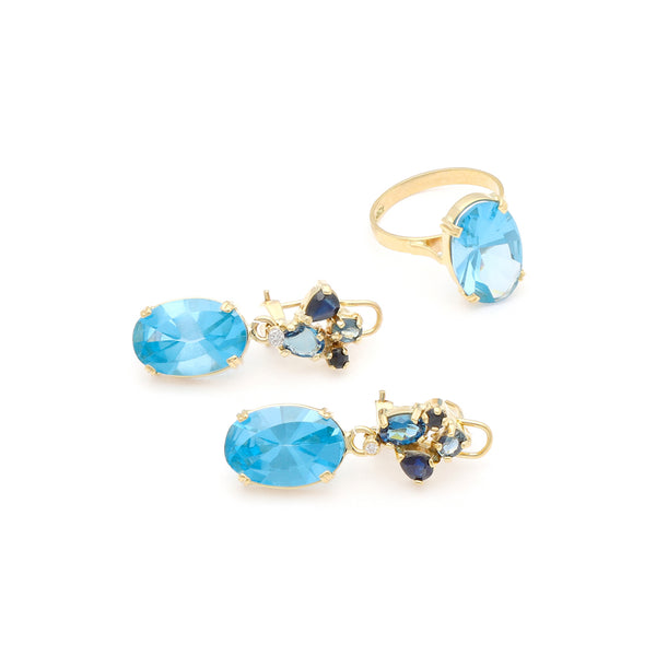 Juego anillo y aretes con colgantes diseño especial con diamantes y topacios en oro amarillo 14 kilates.