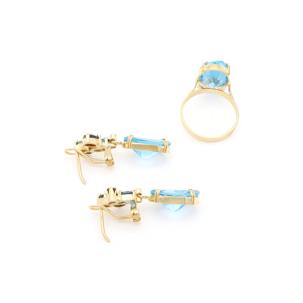 Juego anillo y aretes con colgantes diseño especial con diamantes y topacios en oro amarillo 14 kilates.