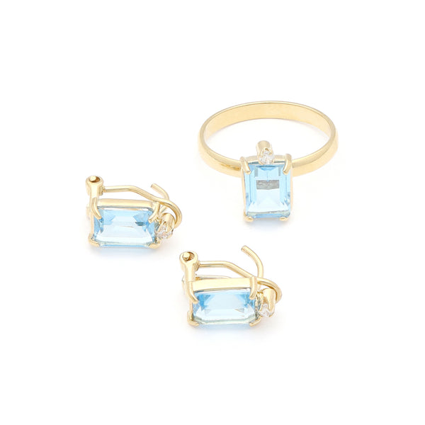 Juego anillo y aretes diseño especial con aguamarina y circonias en oro amarillo 14 kilates.