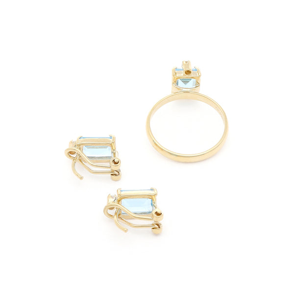 Juego anillo y aretes diseño especial con aguamarina y circonias en oro amarillo 14 kilates.