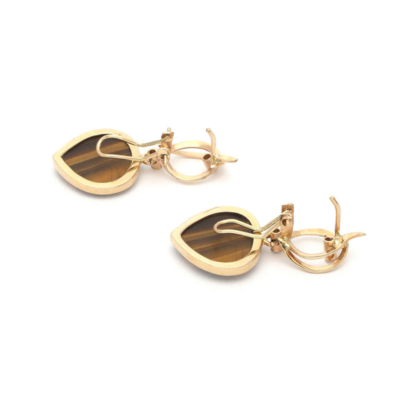 Juego de dije y aretes diseño especial con ojo de tigre y circonias en oro amarillo 14 kilates.