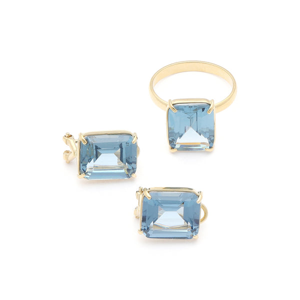 Juego anillo y aretes diseño especial con topacios en oro amarillo 14 kilates.