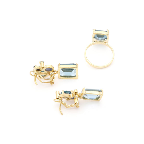 Juego de anillo y aretes diseño especial con zafiros y gemas en oro amarillo 14 kilates.