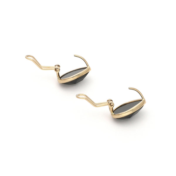 Juego de anillo y aretes diseño especial con ónix en oro amarillo 14 kilates.