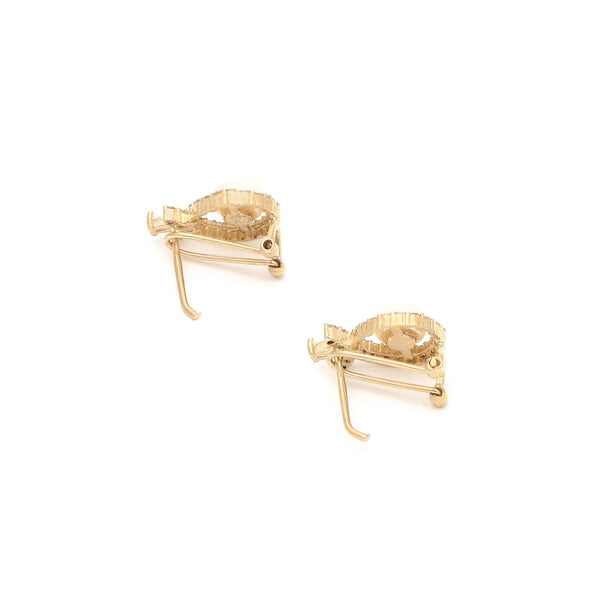 Aretes diseño especial con perla y circonias en oro amarillo 14 kilates.